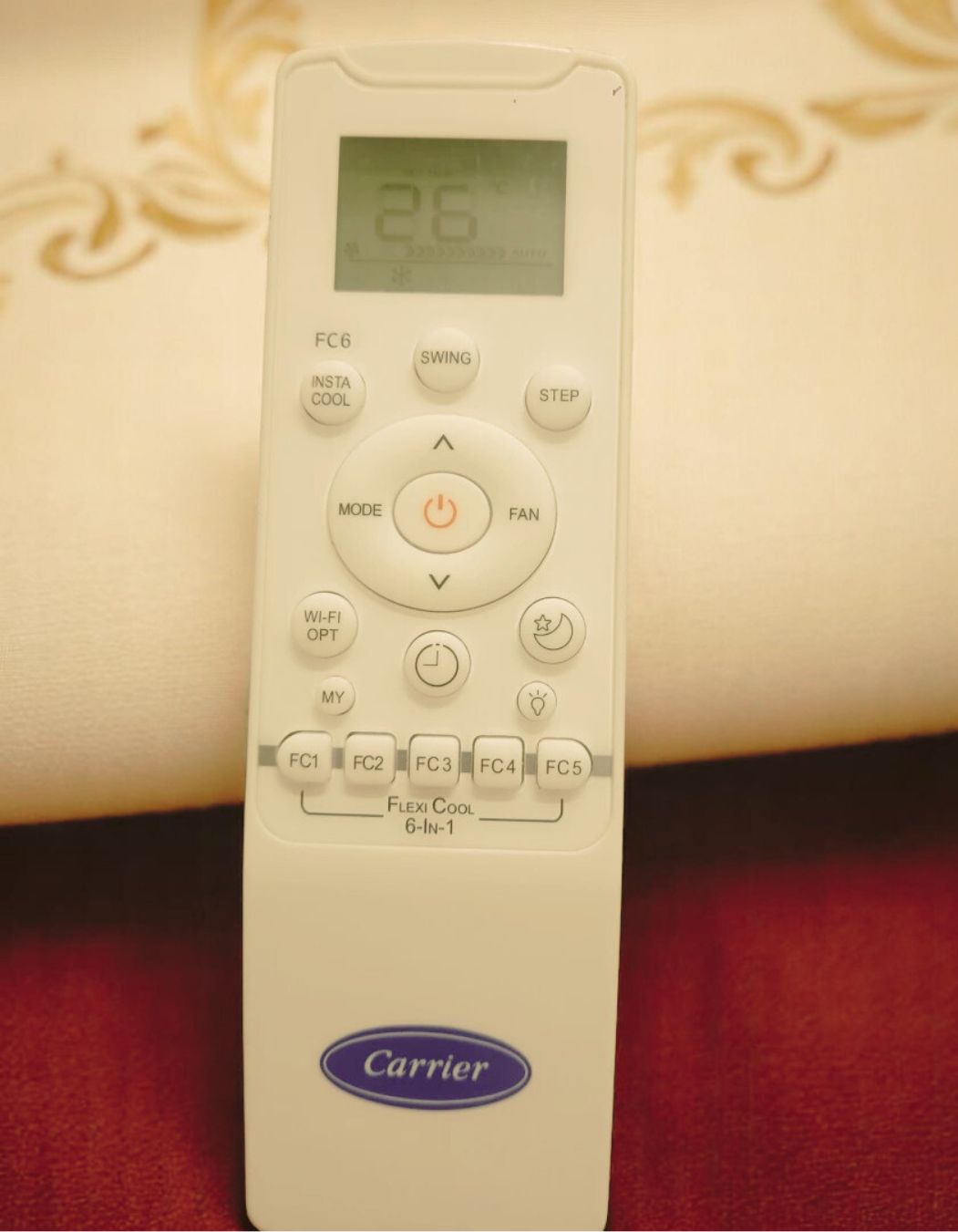 Carrier AC remote close view showing 6 in 1 flexi cool.