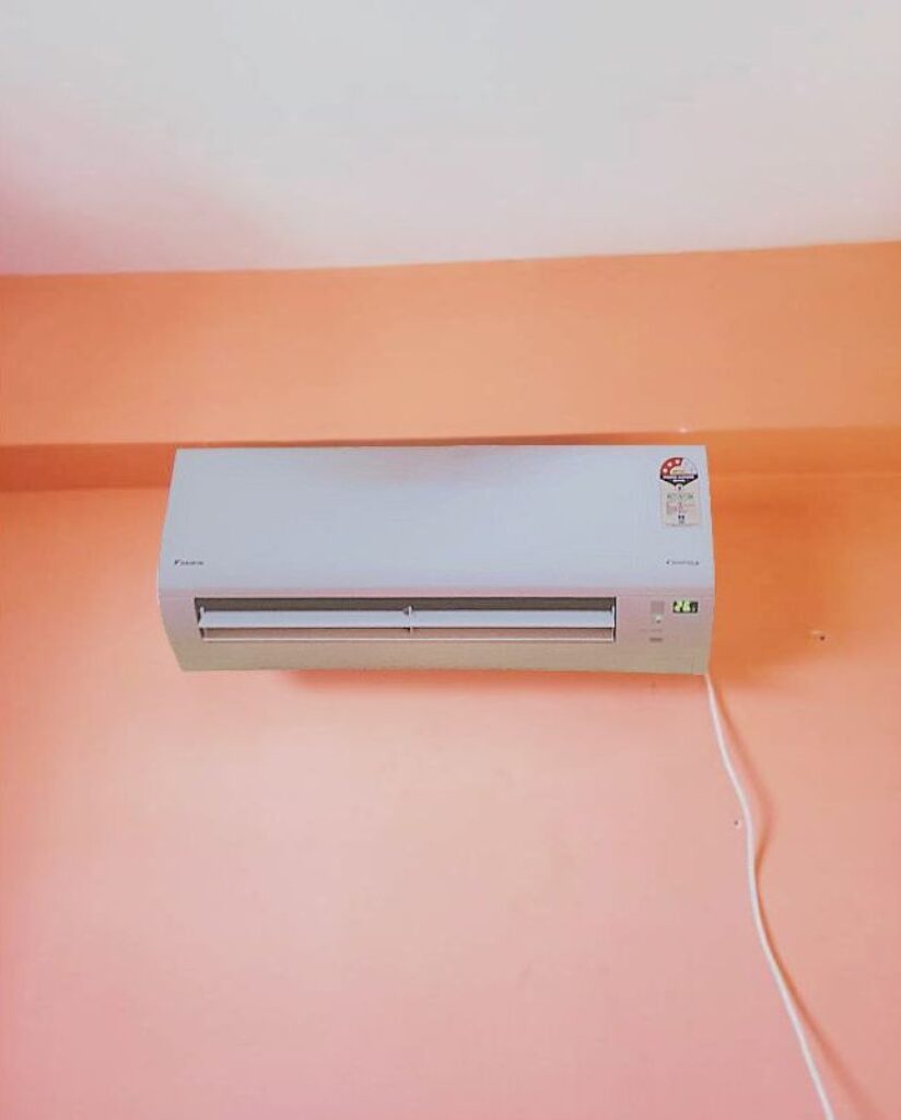 Daikin 1.5 Ton 3 Star ATKL50UV16VAF split AC indoor unit mounted on a wall, set to 26 °C with flap open and running at medium fan speed