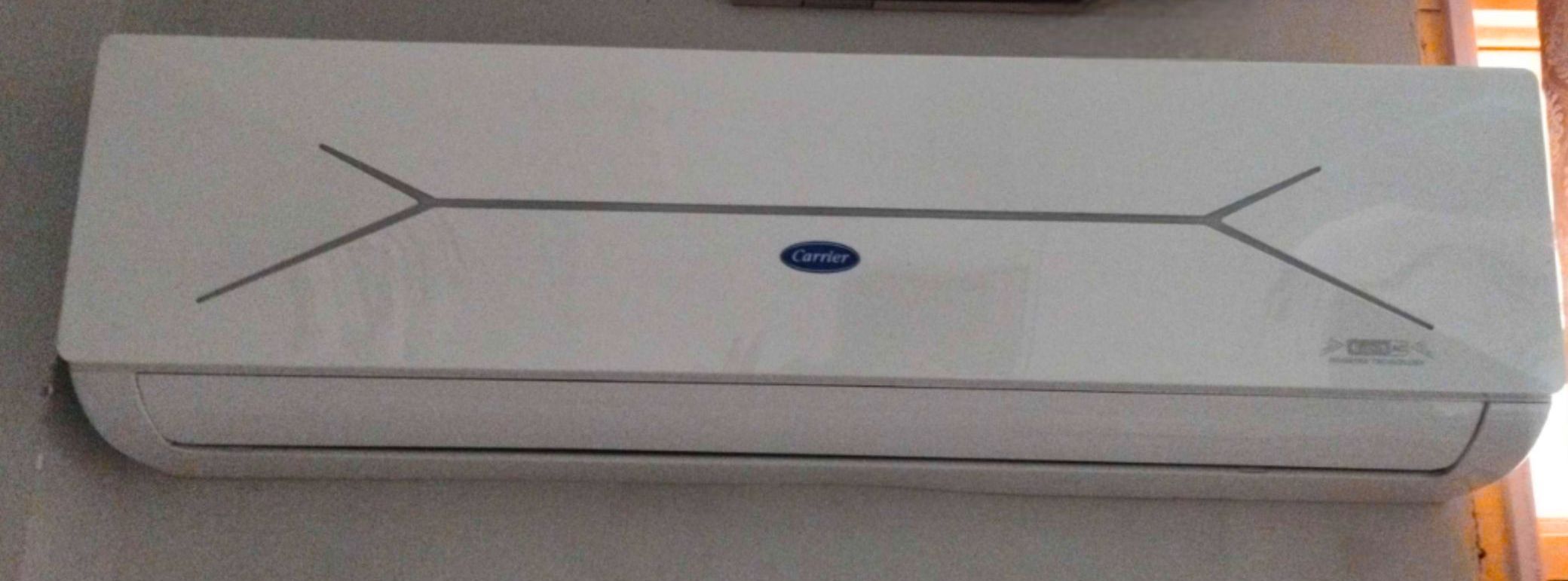 Close view of Carrier 1.5 Ton 3 Star Inverter Split ESTER EDGE FXi AC Indoor unit installed wall mounted