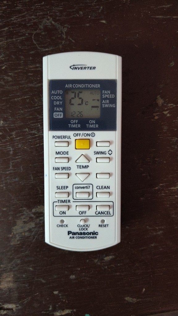 Panasonic inverter AC remote control display showing 25°C temperature setting